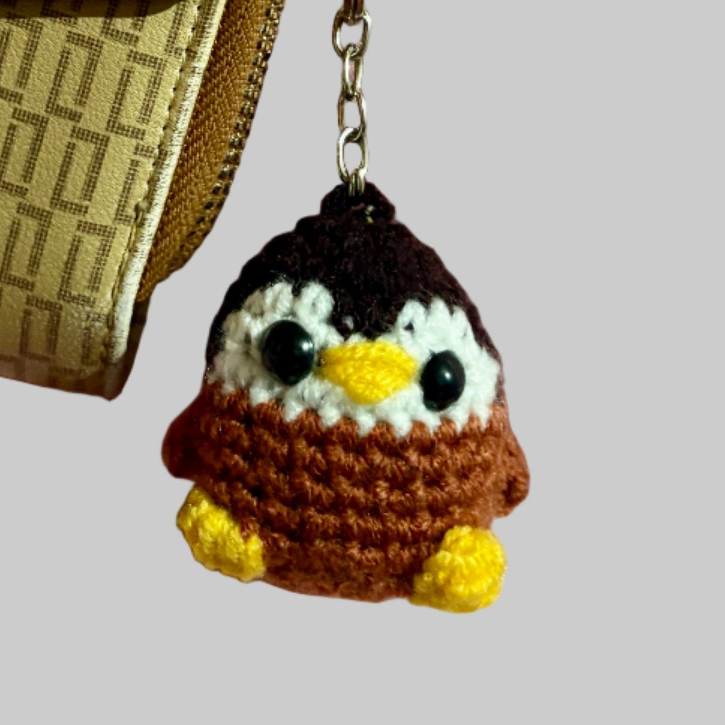 Brown penguin keychain and bag charm