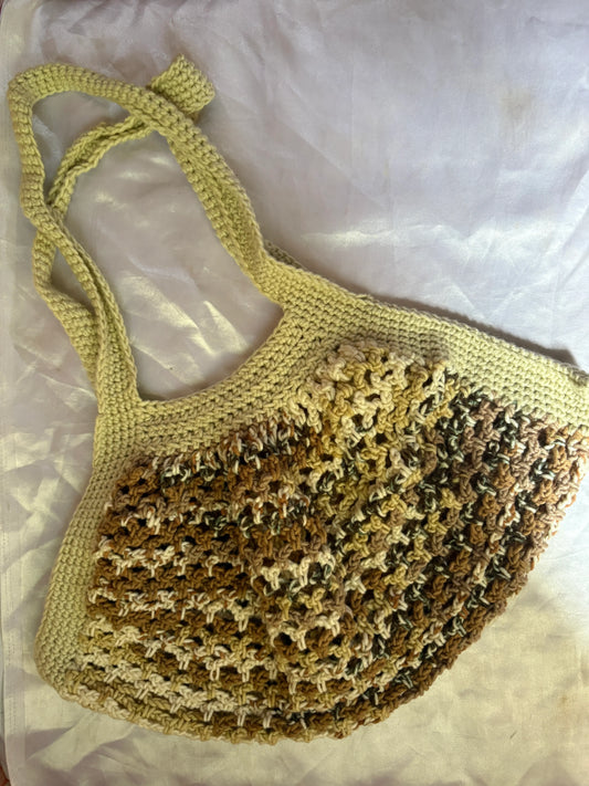 Crocheted animal-patterned hat on a white background