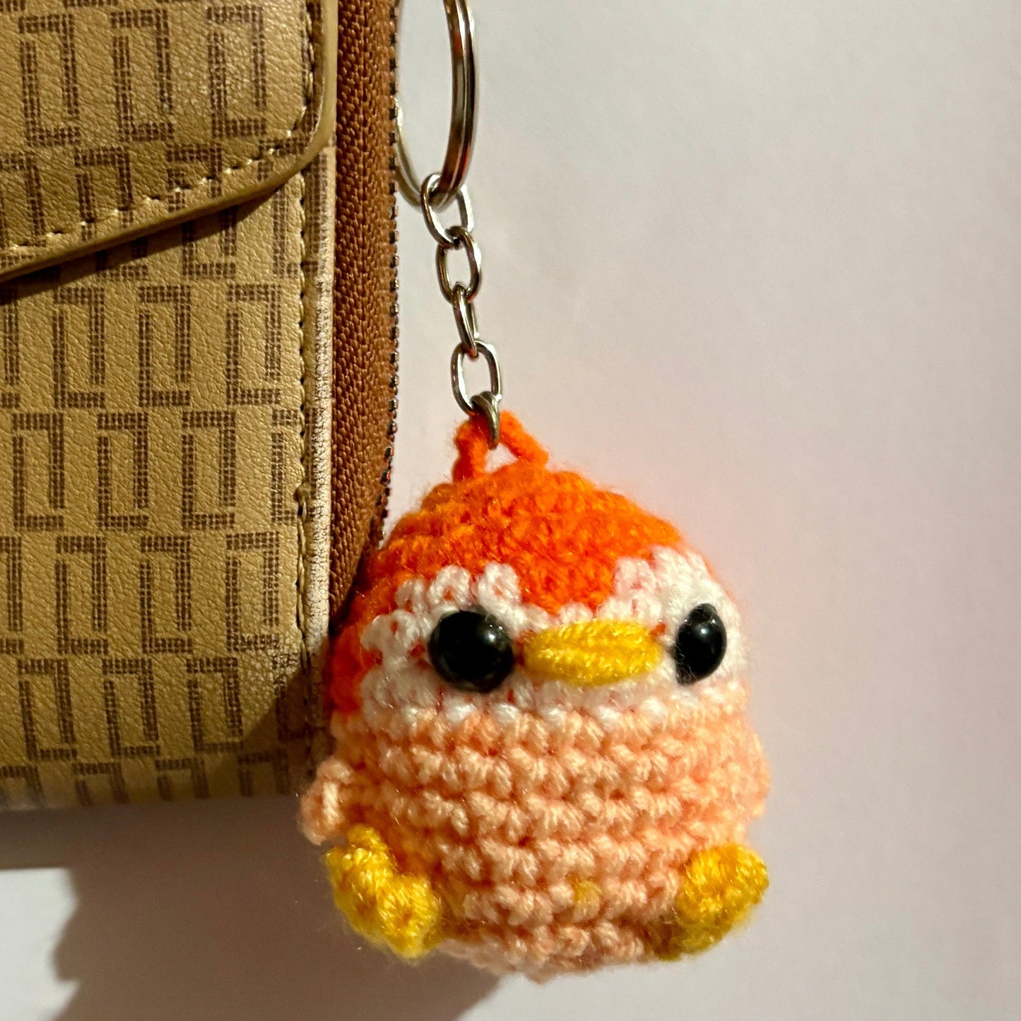 Orange penguin keychain and bag charm